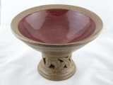 Copper red bowl on pedestal