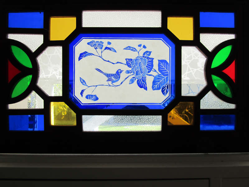 Ancient Chinese
              window with blue-bird
